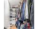 Walk-in closet with ample storage space, shelves, and rods for organizing clothes, shoes, and accessories at 126 Goat Trl, China Grove, NC 28023
