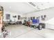 Spacious garage with overhead lighting, storage shelves, and work area at 126 Goat Trl, China Grove, NC 28023