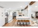 Spacious kitchen with an island, bar stool seating, and stainless steel appliances, creating a perfect culinary haven at 126 Goat Trl, China Grove, NC 28023