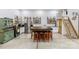 An open kitchen features a large island with seating, shelving, and stainless steel appliances at 126 Goat Trl, China Grove, NC 28023