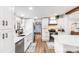 Beautiful white kitchen with stainless steel appliances, ample counter space, and modern fixtures, perfect for cooking at 126 Goat Trl, China Grove, NC 28023