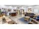 Open-concept living room featuring a modern kitchen, and ample seating perfect for gatherings at 126 Goat Trl, China Grove, NC 28023