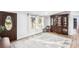Cozy living room with a large front door, bright windows, and beautiful flooring, creating a warm atmosphere at 126 Goat Trl, China Grove, NC 28023
