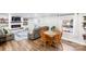 Cozy living room and dining area with a modern fireplace, built-in shelves, and natural light at 126 Goat Trl, China Grove, NC 28023