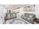 Spacious living room featuring comfortable sofas, a large rug, and an open layout at 126 Goat Trl, China Grove, NC 28023
