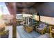 Relaxing outdoor patio with comfortable seating and shade for enjoying the surroundings at 126 Goat Trl, China Grove, NC 28023