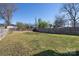 Large backyard with a privacy fence, offering plenty of space for outdoor activities and relaxation at 1305 Price Ave, Kannapolis, NC 28081