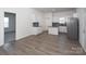 Modern kitchen with stainless steel appliances, granite countertops, and ample cabinet space at 1305 Price Ave, Kannapolis, NC 28081