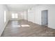 Spacious living room featuring new floors, abundant natural light, and an open layout at 1305 Price Ave, Kannapolis, NC 28081