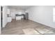 Open-concept living area showcasing luxury floors and seamless flow into the kitchen at 1305 Price Ave, Kannapolis, NC 28081
