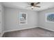 Bright bedroom with natural light, ceiling fan, and neutral walls at 132 Shady Grove Rd, Kings Mountain, NC 28086
