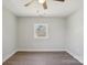 Neutral room with ceiling fan, white trim and baseboards, and one window at 132 Shady Grove Rd, Kings Mountain, NC 28086