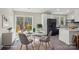 Bright dining area with a sliding glass door to the deck and modern, neutral decor at 132 Shady Grove Rd, Kings Mountain, NC 28086