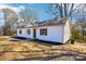 Well-maintained home with white siding, dark shutters, and a manicured lawn at 132 Shady Grove Rd, Kings Mountain, NC 28086