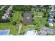An aerial shot of the community pond with fountain, pool, and tennis courts at 15124 Hugh Mcauley Rd, Huntersville, NC 28078