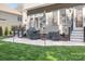 Cozy back patio with stone pavers, grill, patio umbrella, and easy access to the house at 15124 Hugh Mcauley Rd, Huntersville, NC 28078
