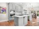This kitchen boasts stainless steel appliances, a central island, and stylish pendant lighting at 15124 Hugh Mcauley Rd, Huntersville, NC 28078