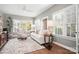 Bright and airy living room with large windows, plush seating, and elegant decor at 15124 Hugh Mcauley Rd, Huntersville, NC 28078