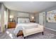 Beautiful bedroom features neutral tones, soft lighting, and stylish decor at 15311 Lake Ridge Rd, Charlotte, NC 28278