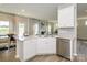 Bright kitchen featuring modern cabinets, stainless steel appliances, and an open layout at 15311 Lake Ridge Rd, Charlotte, NC 28278