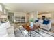Inviting living room with open layout showcasing hardwood floors and an abundance of natural light at 15311 Lake Ridge Rd, Charlotte, NC 28278