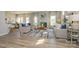 Spacious living room features hardwood floors, fireplace, large windows, and neutral color palette at 15311 Lake Ridge Rd, Charlotte, NC 28278
