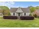 Charming single story home with a well maintained lawn and manicured landscaping at 1644 Morningside Dr, Charlotte, NC 28205