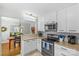 Open kitchen view into the dining and living areas of the home at 1644 Morningside Dr, Charlotte, NC 28205