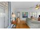 Inviting living room features hardwood floors, a neutral color scheme, and a large stained-glass window at 1644 Morningside Dr, Charlotte, NC 28205