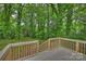 Wooden back deck overlooks lush greenery and trees at 1837 Academy St, Charlotte, NC 28205