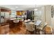 Modern kitchen with granite countertops, stainless steel appliances, and an adjacent dining area for entertaining at 1837 Academy St, Charlotte, NC 28205