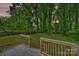 Spacious wooden deck overlooking a lush backyard, perfect for outdoor entertaining at 1837 Academy St, Charlotte, NC 28205