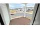 A balcony view showcases the community's charming homes and well-maintained streetscape at 19732-A School St, Cornelius, NC 28031