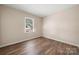 Bedroom featuring a large window with natural light at 205 King David Ln, Gastonia, NC 28056
