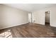 Large bedroom featuring vinyl flooring and ensuite access at 205 King David Ln, Gastonia, NC 28056