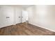 Bedroom featuring a double closet and modern vinyl flooring at 205 King David Ln, Gastonia, NC 28056