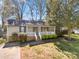 Charming single-story home featuring a welcoming front porch and manicured landscaping, enhancing its curb appeal at 205 King David Ln, Gastonia, NC 28056