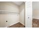 Practical laundry room with shelf providing a dedicated space for laundry tasks at 205 King David Ln, Gastonia, NC 28056
