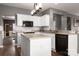 Bright kitchen with white cabinets, granite countertops, and stainless appliances at 2426 Tory Oak Pl, Matthews, NC 28105