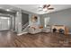 Spacious living room with hardwood floors, neutral walls, and plenty of natural light at 2426 Tory Oak Pl, Matthews, NC 28105
