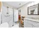 Bathroom features a glass walk-in shower, granite countertops, and white cabinets at 2540 Deal Rd, Mooresville, NC 28115