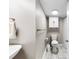 Bathroom includes a toilet, towel rack, sink, and a walk-in shower at 2540 Deal Rd, Mooresville, NC 28115