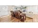 Inviting living space with hardwood floors, a cozy fireplace, and an open design perfect for entertaining at 2540 Deal Rd, Mooresville, NC 28115