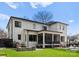 Expansive backyard features a well-manicured lawn, a modern patio, and a sleek fence, ideal for outdoor living at 300 Mammoth Oaks Dr, Charlotte, NC 28270