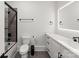 Modern bathroom features sleek black fixtures, a tiled shower-tub combo, and a clean, minimalist design at 300 Mammoth Oaks Dr, Charlotte, NC 28270