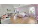 Charming bedroom with pink accents, patterned wallpaper, and plenty of space for play and relaxation at 300 Mammoth Oaks Dr, Charlotte, NC 28270