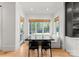 Cozy breakfast nook featuring built-in seating, a large window, and modern decor at 300 Mammoth Oaks Dr, Charlotte, NC 28270