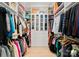 Spacious walk-in closet with custom shelving and plenty of storage space for clothing at 300 Mammoth Oaks Dr, Charlotte, NC 28270
