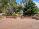 Large brick patio with manicured landscaping, perfect for outdoor entertaining at 3140 S Legacy Park Blvd, Fort Mill, SC 29707