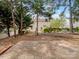 A brick patio is surrounded by mature landscaping, offering a private outdoor space at 3140 S Legacy Park Blvd, Fort Mill, SC 29707